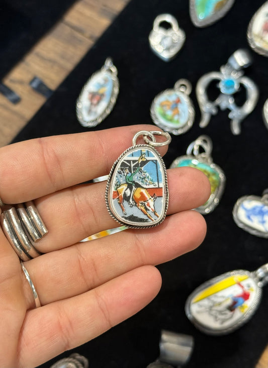 Bull rider pendant