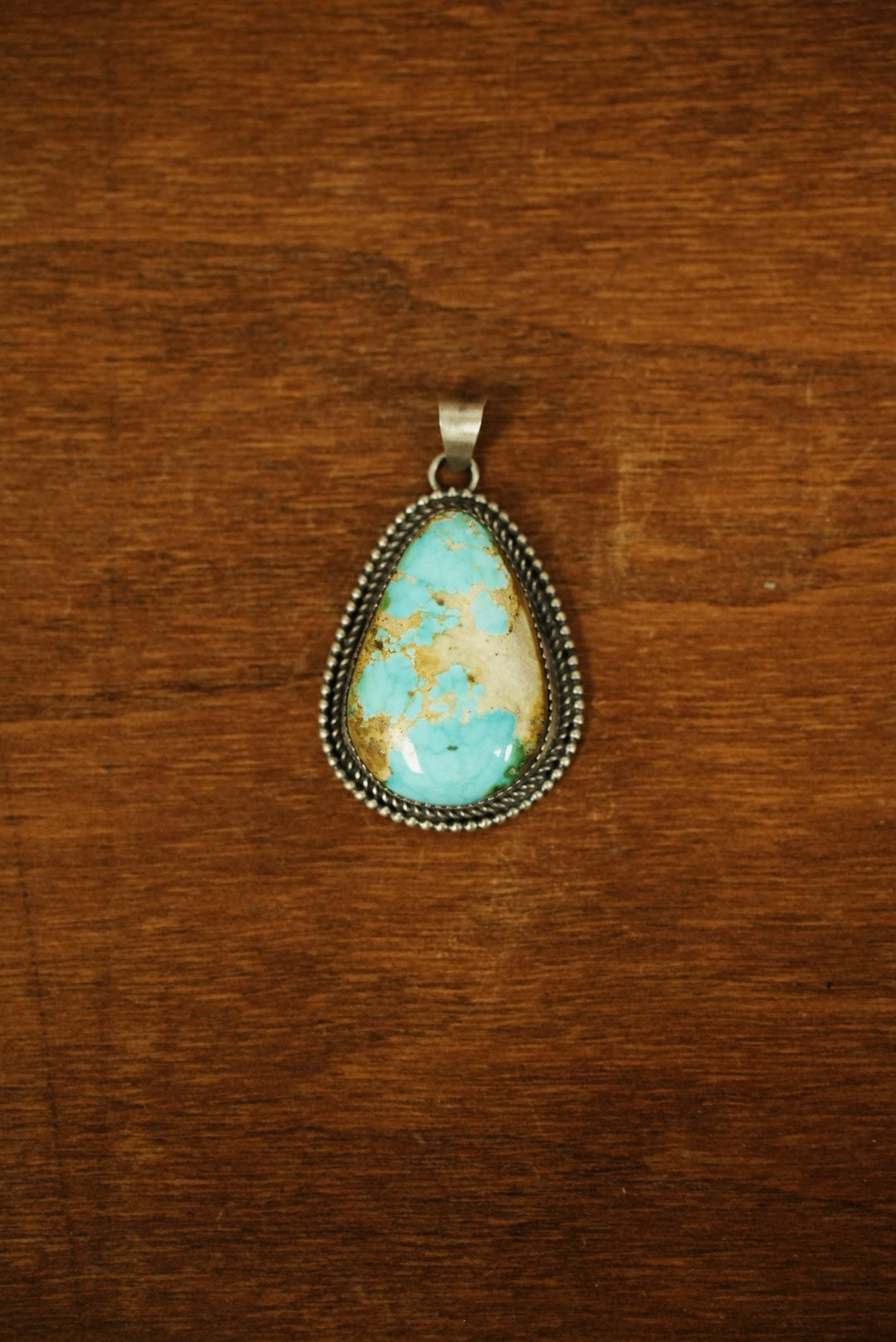 Sonoran Gold Pendant Made. by Eli Skeets